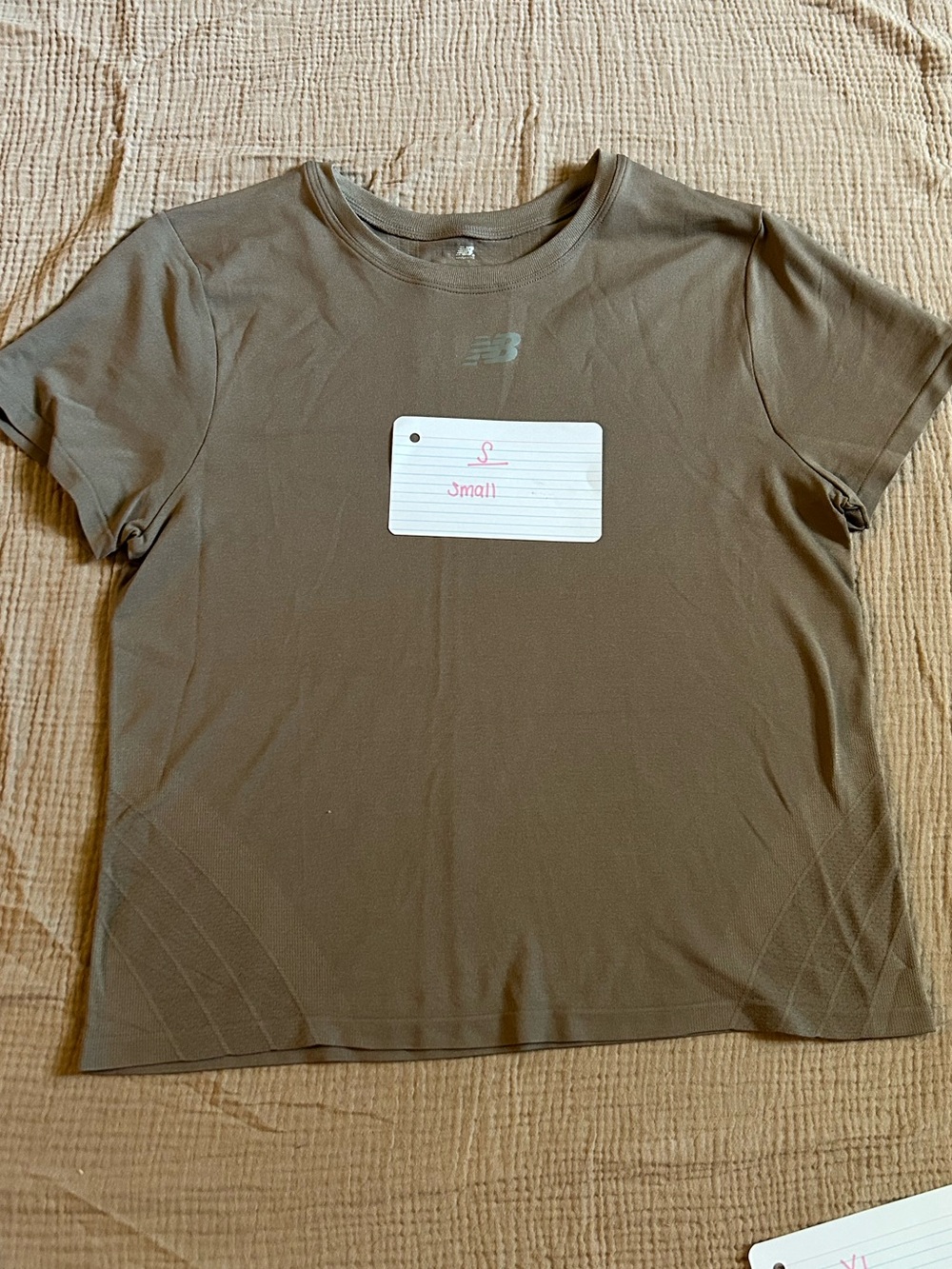 New Balance Women's Short Sleeve Tee in Brown